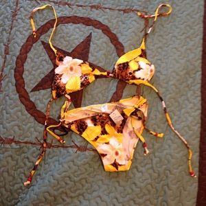 Brand new yellow bikini with white flower design