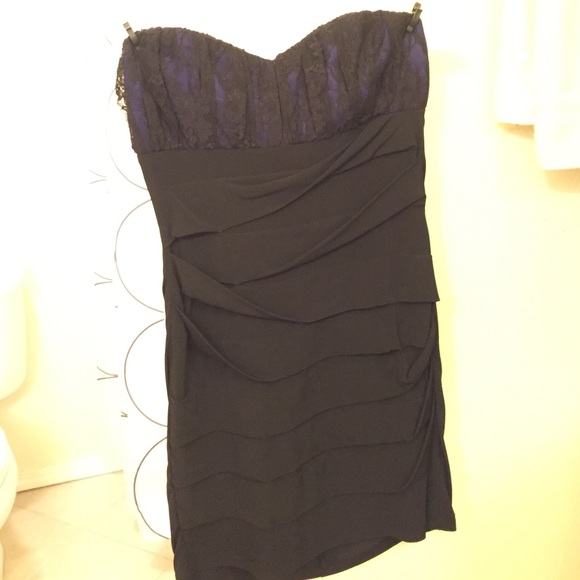 Black dress with lace detail.