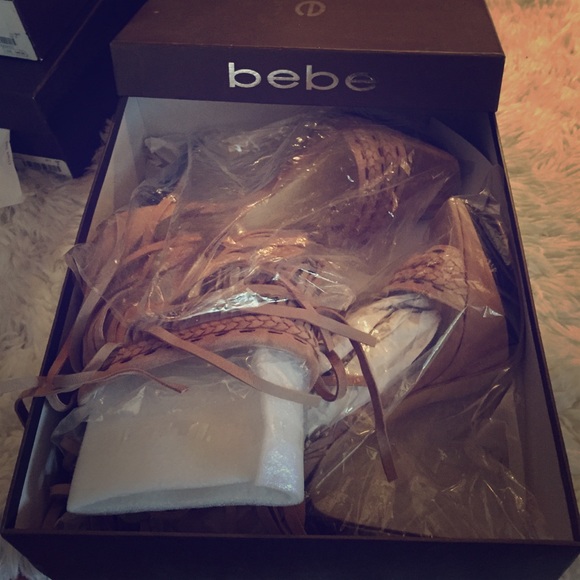 Very briefly worn BEBE fringe platforms