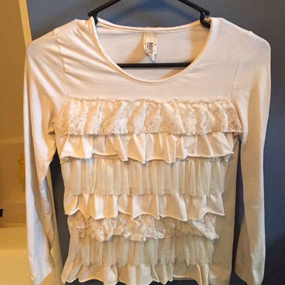 Cream longsleeve shirt with fringes on the front