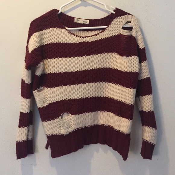 Striped sweater with intentional distress