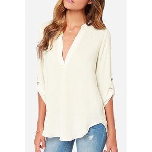 Plunging neck 3/4 sleeve blouse