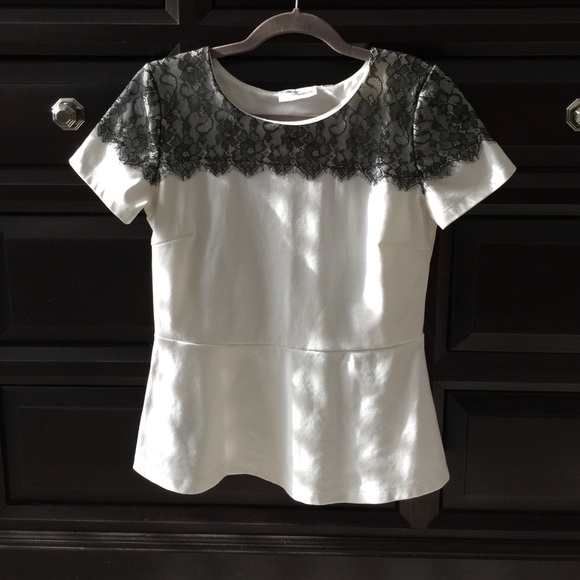 Cream with black lace peplum top