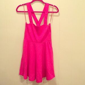 Pink skater dress with cross cross back