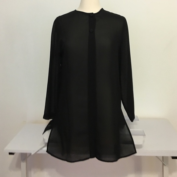 Elegant black sheer 2 button top.  Rest is open.