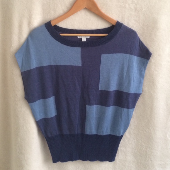 Sleeveless sweater.