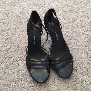 Black strappy heels.