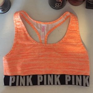 A pink sports bra