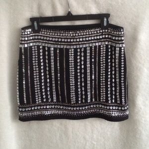 Beaded mini skirt.