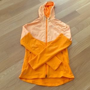 Orange Nike running jacket