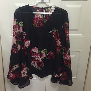 Bell sleeved floral blouse size XS
