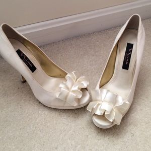 Nina New York peep toe satin pumps, off white.