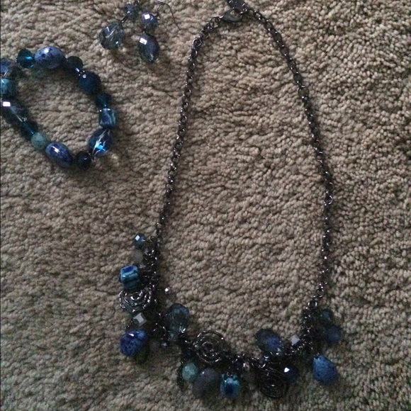Necklace, earrings and bracelet.