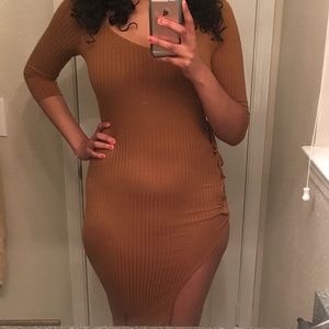Mustard colored fitted dress.