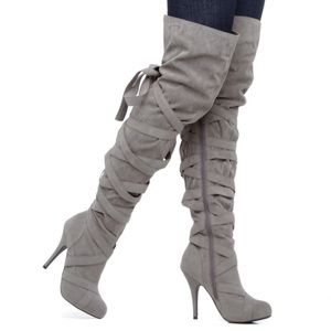 Shoedazzle over the knee high heel boots.