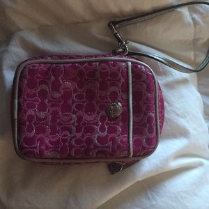 coach wristlet like new, pink with some silver