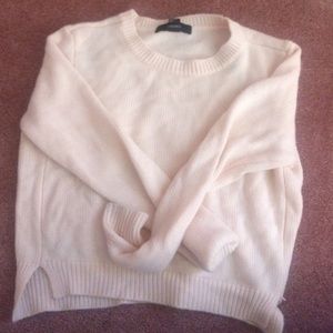 A pink Sweater crop top from forever 21