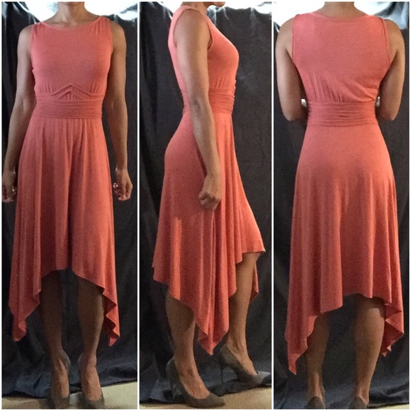 Pretty salmon color dress.