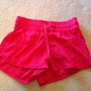 Bright pink running shorts