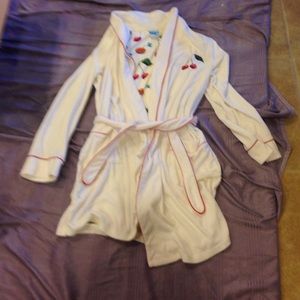 Small white soft terry cloth robe.