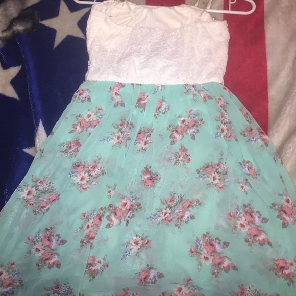 A dress with floral pattern on the bottom - Picture 2 of 2