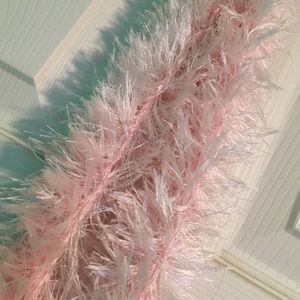 A long pink thin scarf