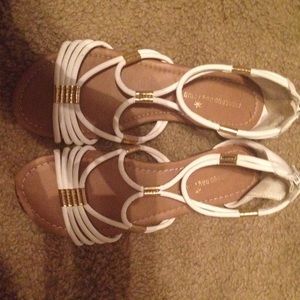 White Montego Bay club sandals warn once.