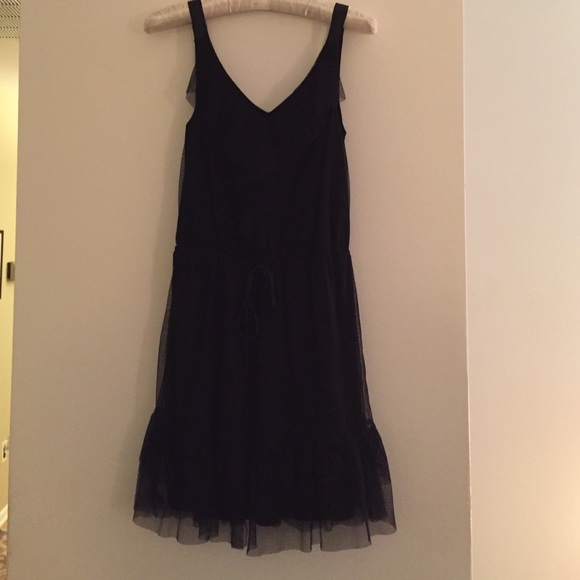 Black dress with Ruffled front and netting overlay