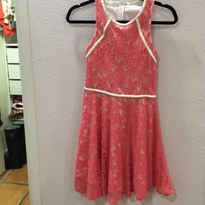 Coral lace dress with leather detail