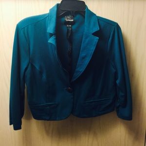 Turquoise mini jacket.