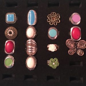 A "LOT" of costume jewelry rings.