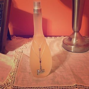 3.4 fl oz glow by jlo barley used