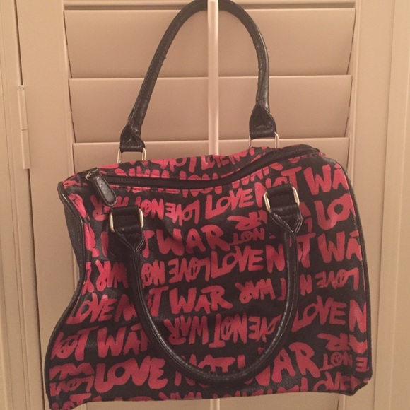 Pink and black handbag from Charlotte Russe
