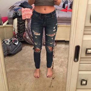 VERY distressed American Eagle jeans