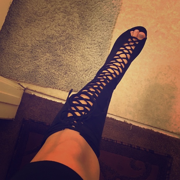 Lace up black high heel boots