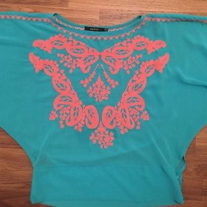 teal blouse