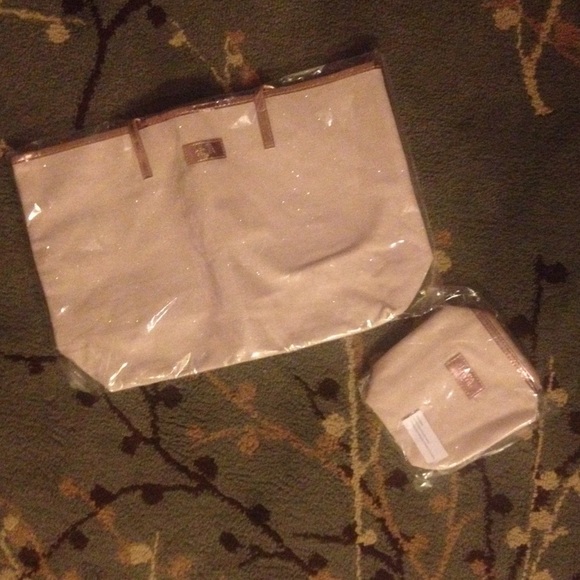 Laura Geller tote and make up bag.