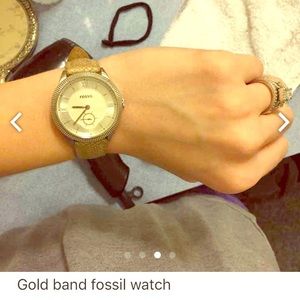 Gold band fossil watch