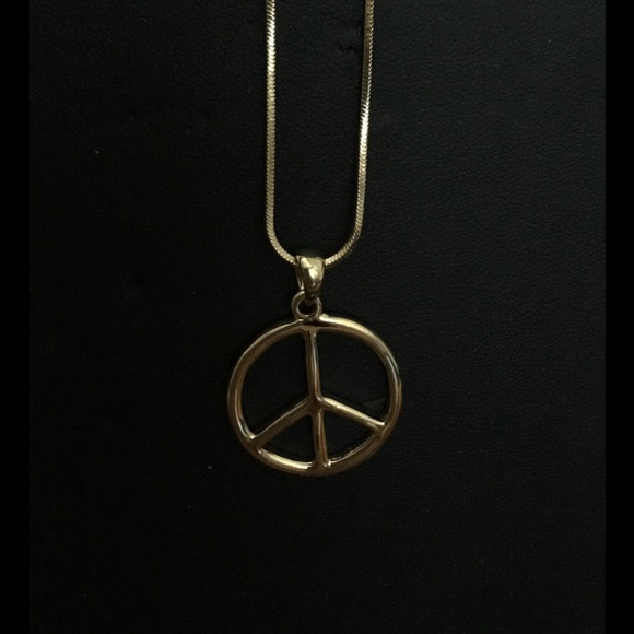 NWT Gold, Peace sign necklace.