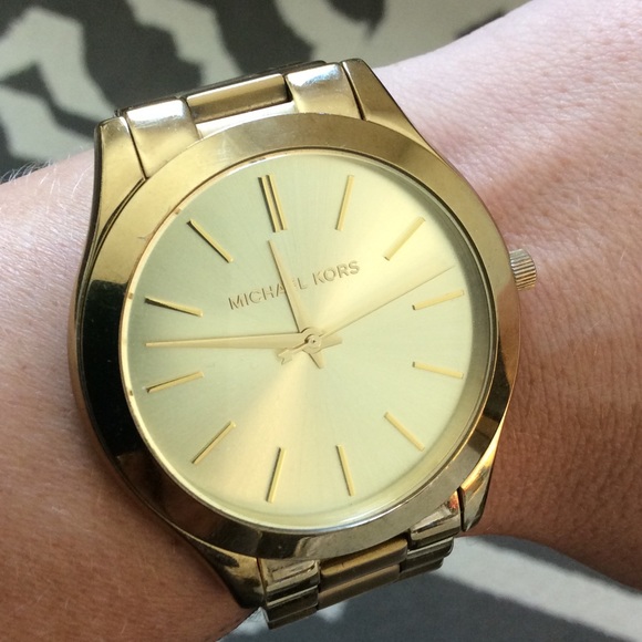 Michael Kors slim runway gold watch