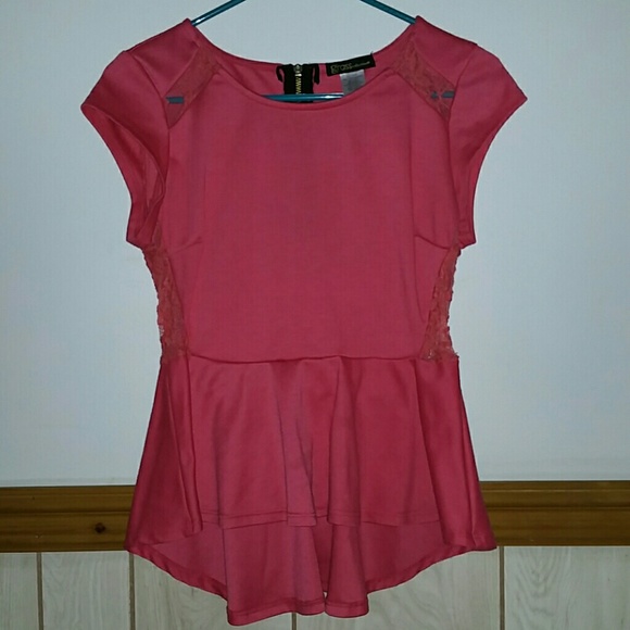 Coral peplum shirt with lace cutouts