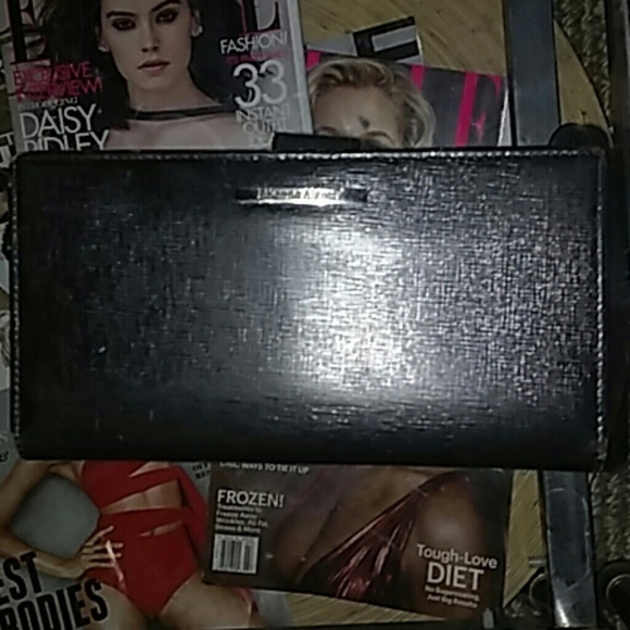 Etienne Aigner leather checkbook wallet