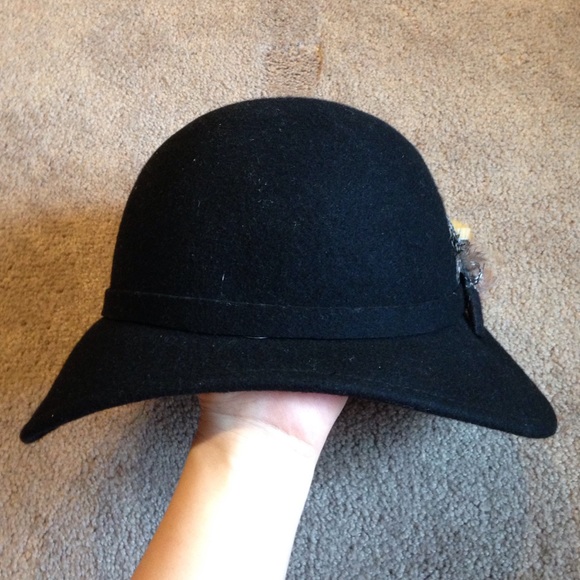 Black hat with feather accent