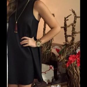 Boutique brand black faux leather dress