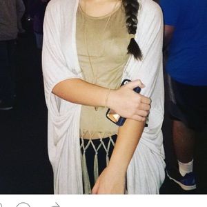 Faux suede top with tassel/fringe trim