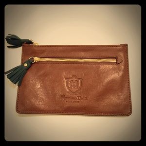 Brown leather pochette with leather tassels. NWOT