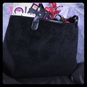 Faux fur tote with over $35.00 worth of makeup