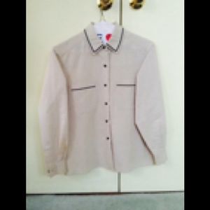 Beige button-down with black piping