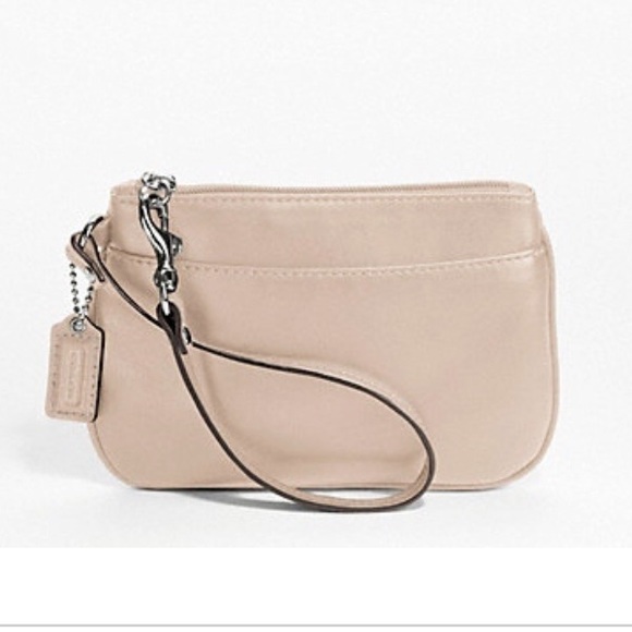 Coach wristlet clutch never been used!!! 🍾