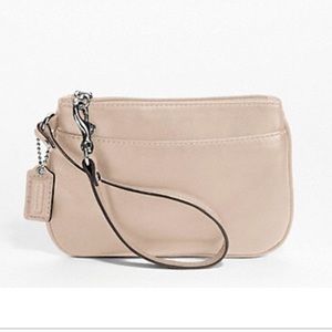 Coach wristlet clutch never been used!!! 🍾